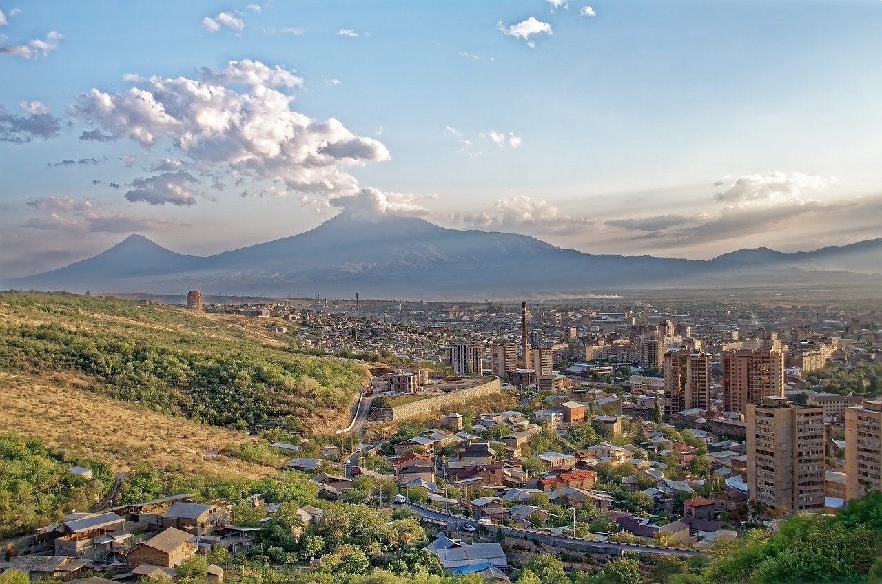 Yerevan city view with Mount Ararat in the distance during a clear sunset